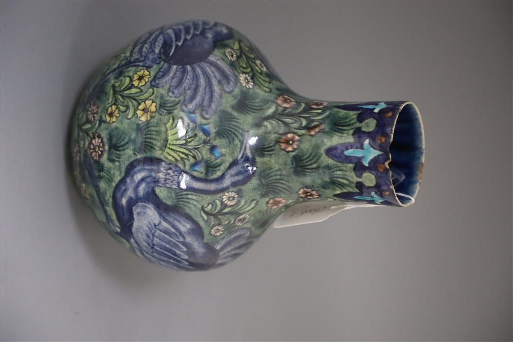 A rare William de Morgan Ostrich bottle vase, c.1888-97, painted by Joe Juster, 24cm high, 18cm wide
